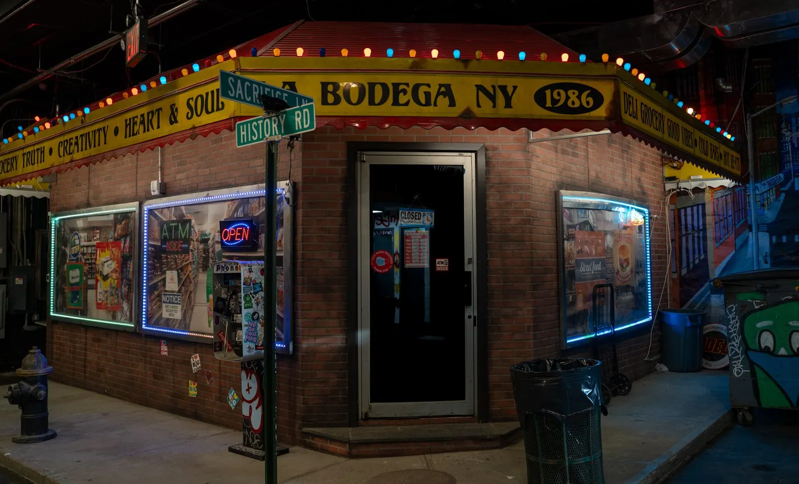 Corner store facade at night on the set