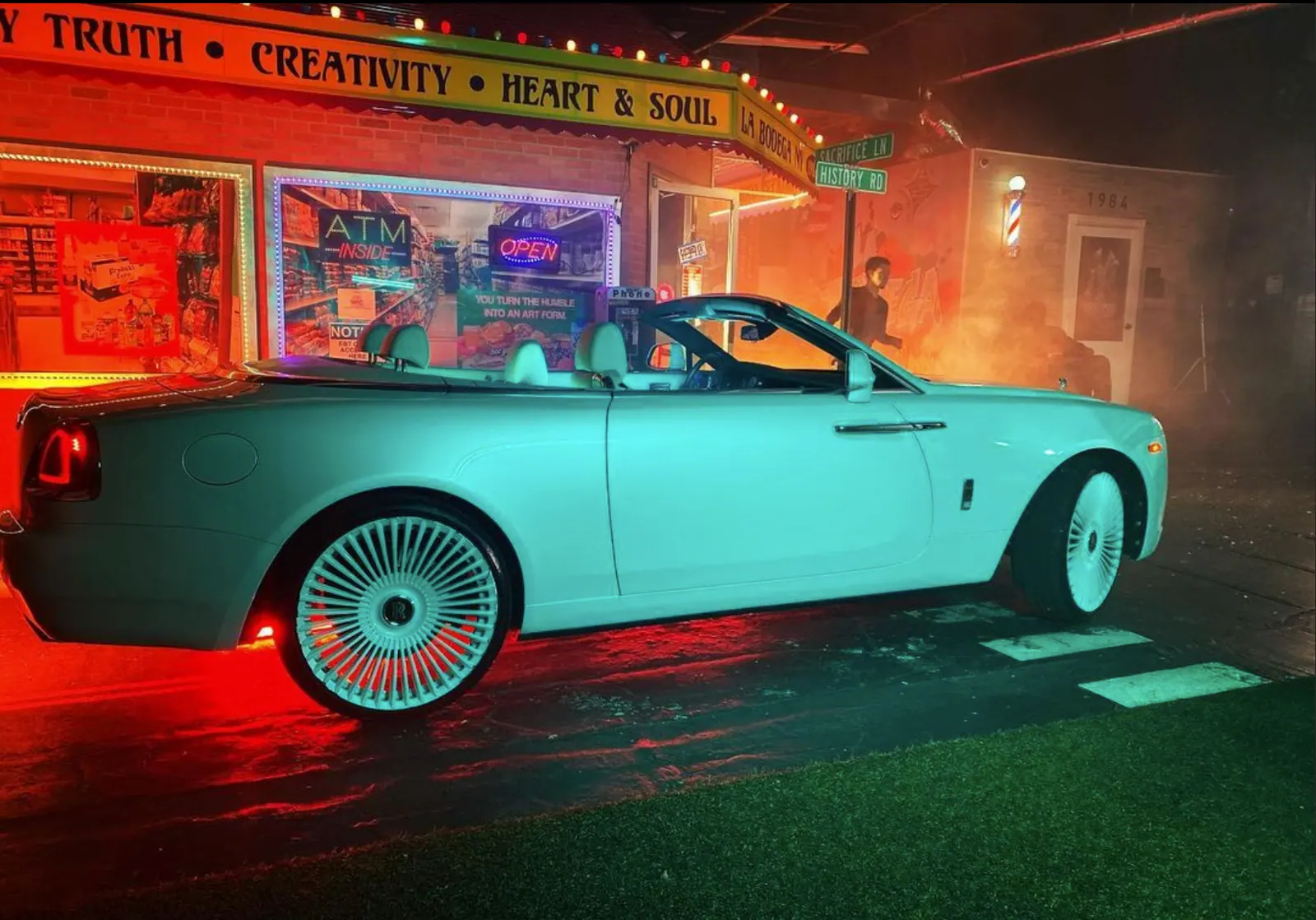 Vintage Rolls-Royce under orange neon on the street set